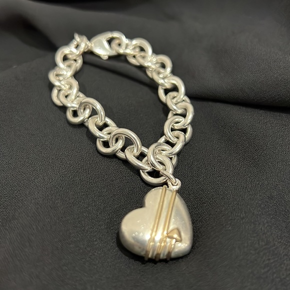 Sterling link with 14 kt gold accents Tiffany puffed heart bracelet. - Picture 2 of 5